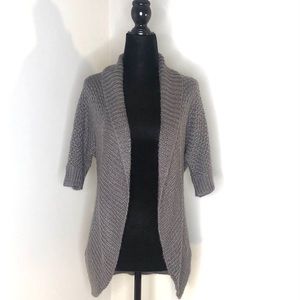 Women’s grey cardigan.